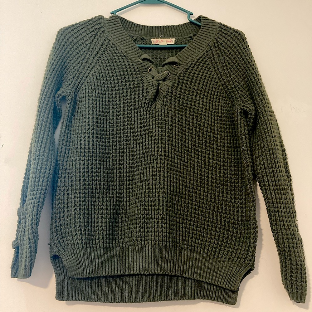 Green knitted sweater